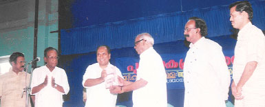 2002 September 17 The then Chief Minister of KeralaA.K.Antony is releasing the book G.Kumara Pilla:AatmavinteAyalkkaran by presenting the first copy to P.Viswambharan. Seated on the dais are the Former Minister P.P.George, Dr. Sukumar Azhikode, Prof. K.G.Sankara Pilla, K. Parameswara Sarma, etc.